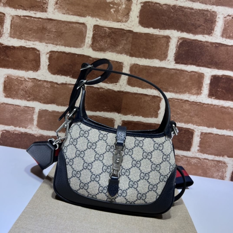 G*u*i top handle bags